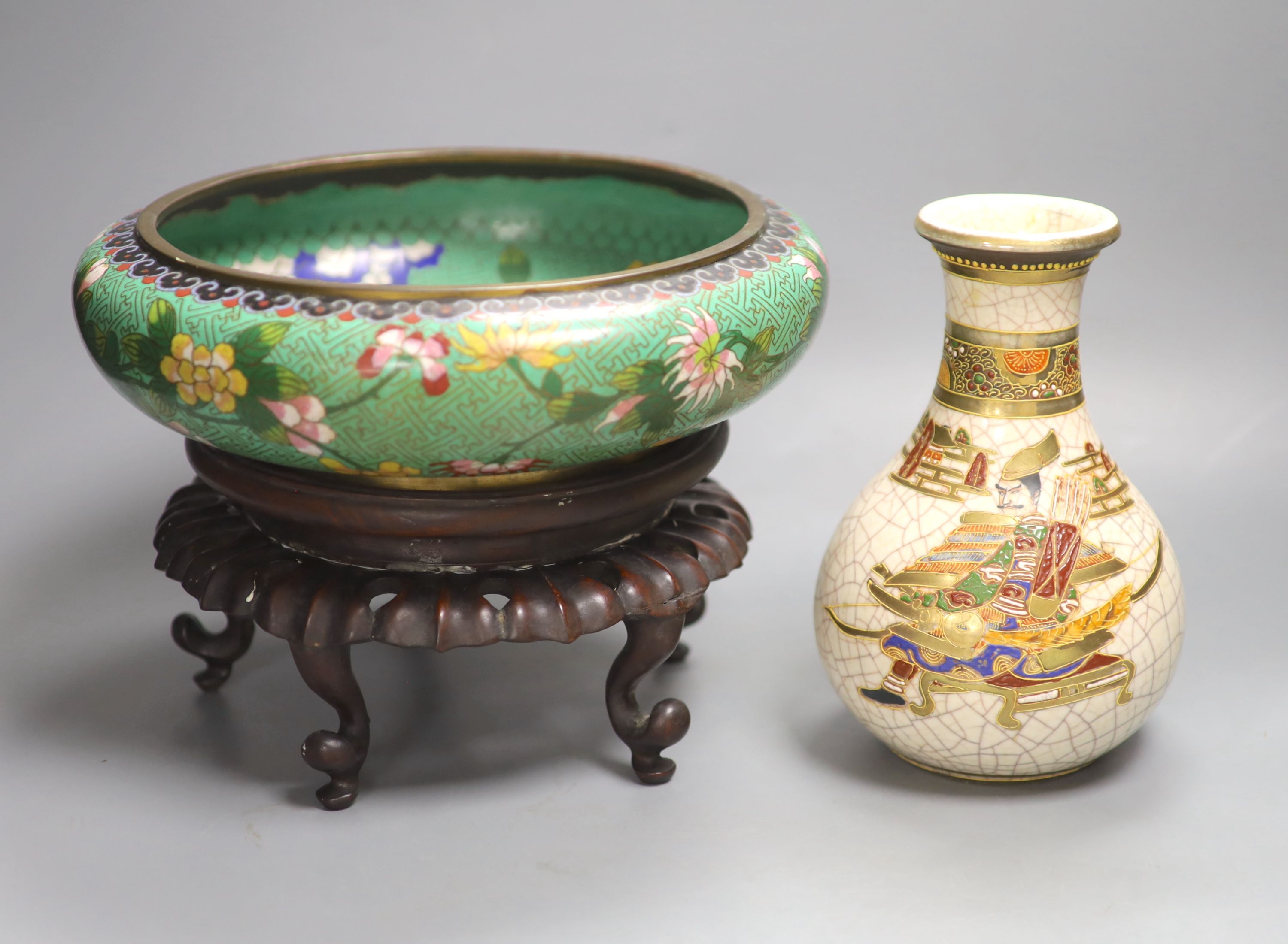 A Chinese cloisonne enamel bowl, wood stand, early 20th century and a Japanese vase